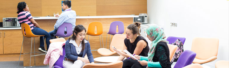 Research students in the postgraduate research hub at The University of Manchester